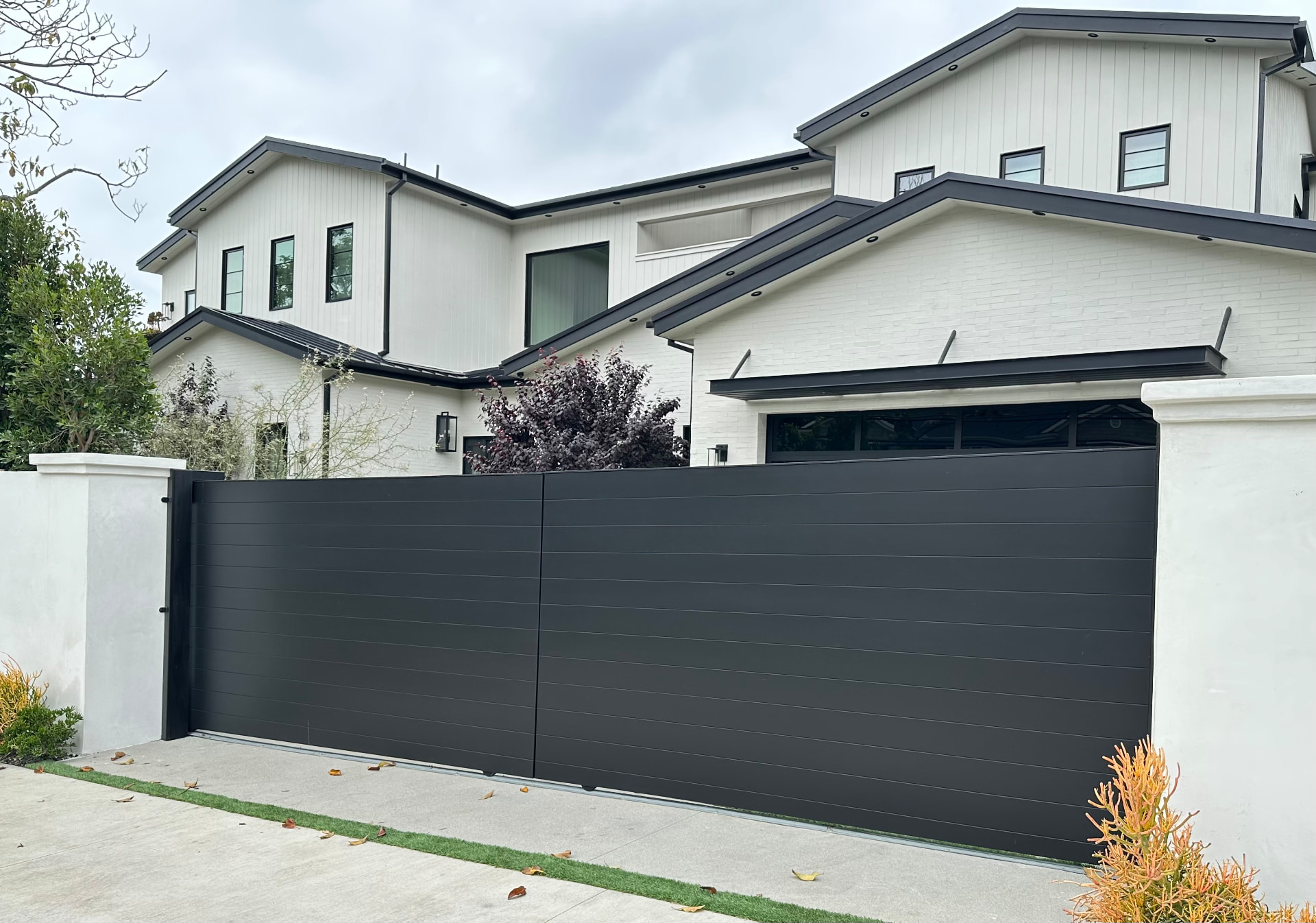 DG-05 — Custom Black Motorized Sliding Driveway Gate