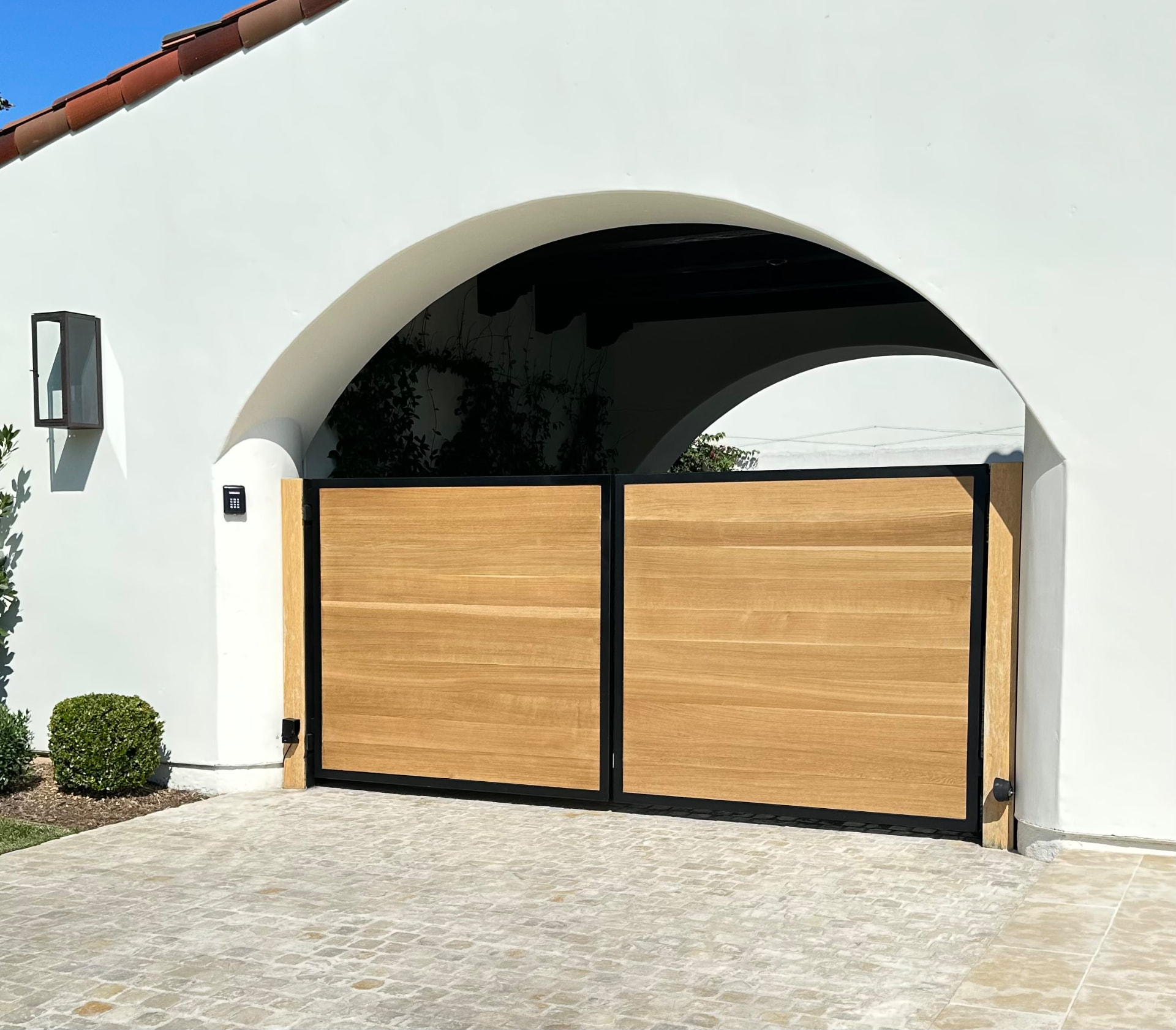 DG-07 — Rift Oak Double Driveway Gates with Black Steel Frame
