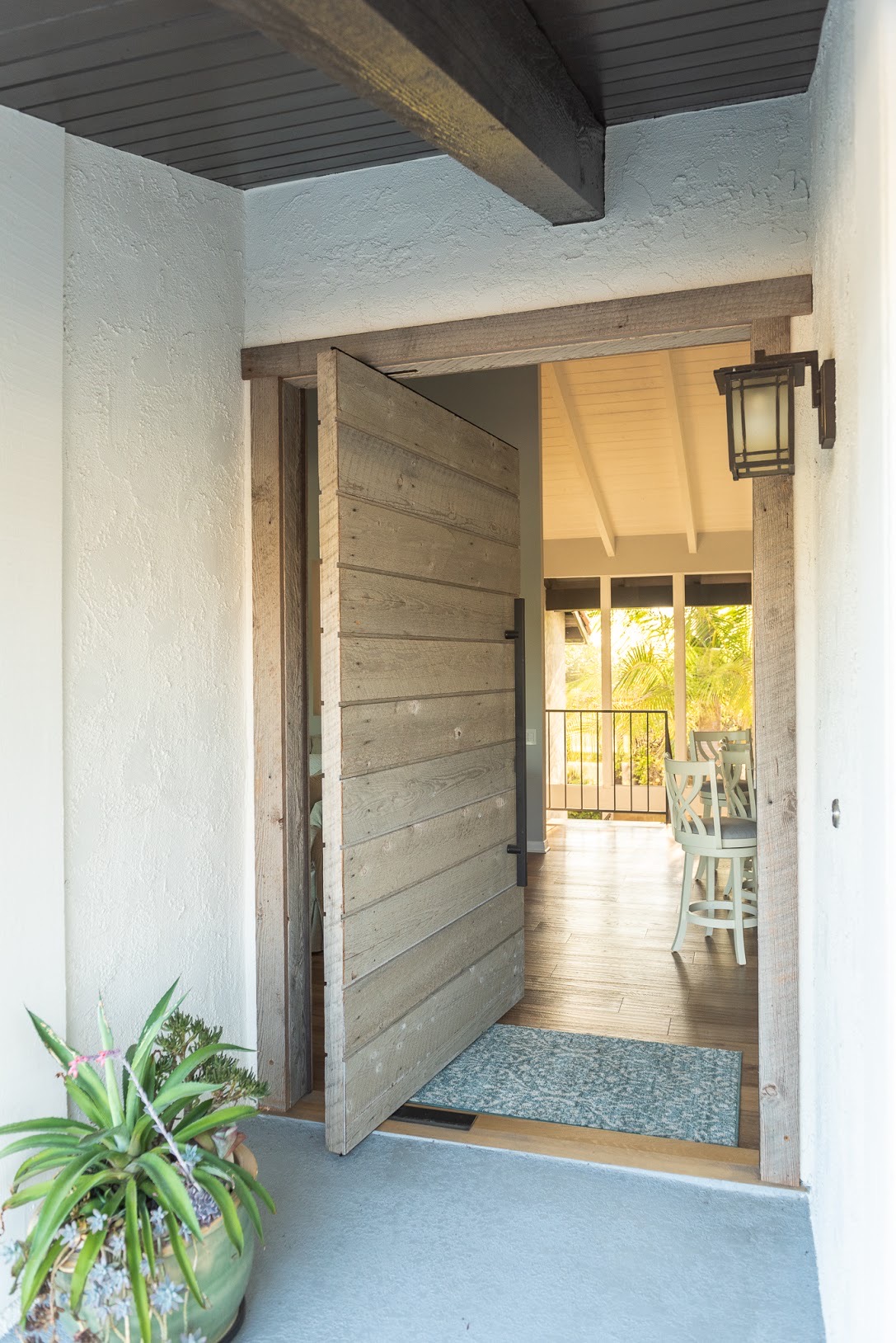 ED-07 — Reclaimed Timber Pivot Entry — Exterior & Interior