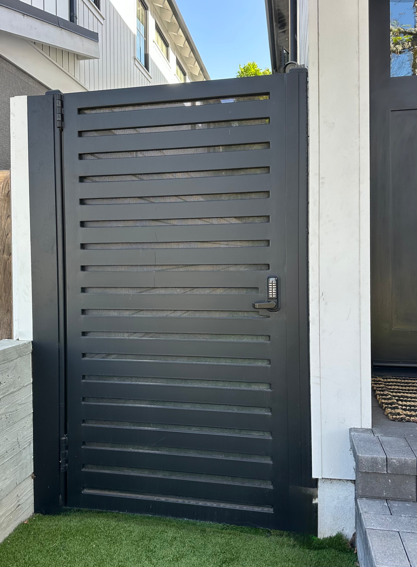 PG-08 — Black Steel Gate with Open Slats