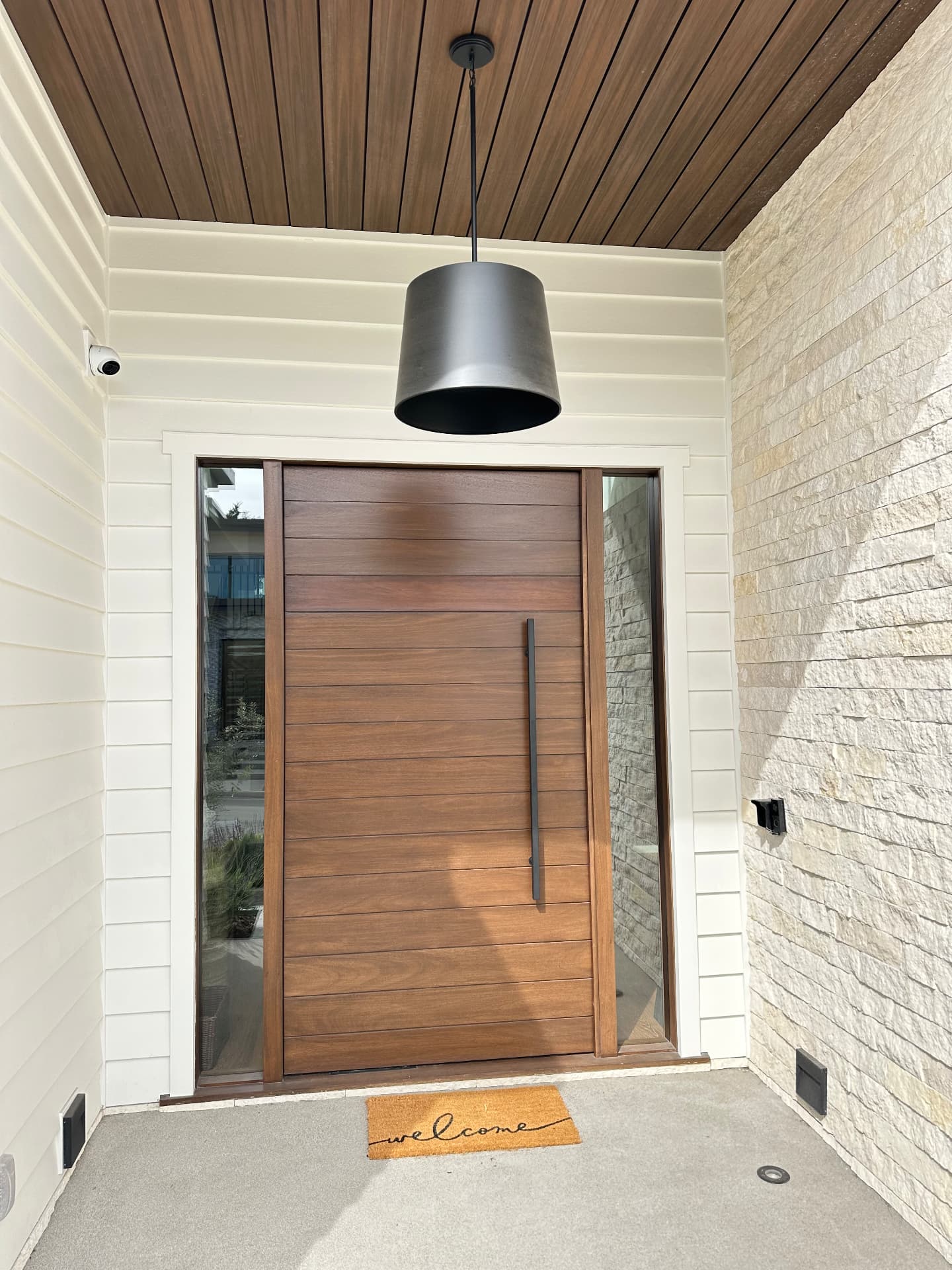 ED-09 — African Mahogany Horizontal Slat Pivot Door with Sidelights